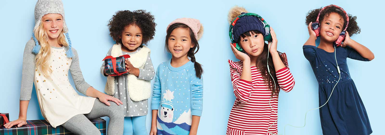 Die fünf beliebtesten Designdetails an Weihnachtspullovern für Mädchen